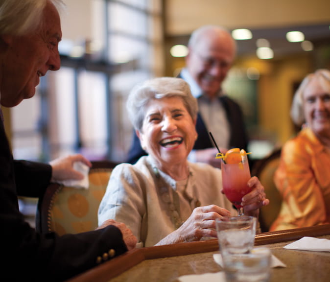 Vi at Grayhawk residents enjoy happy hour.