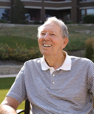 Lee Chouinard smiles at the camera